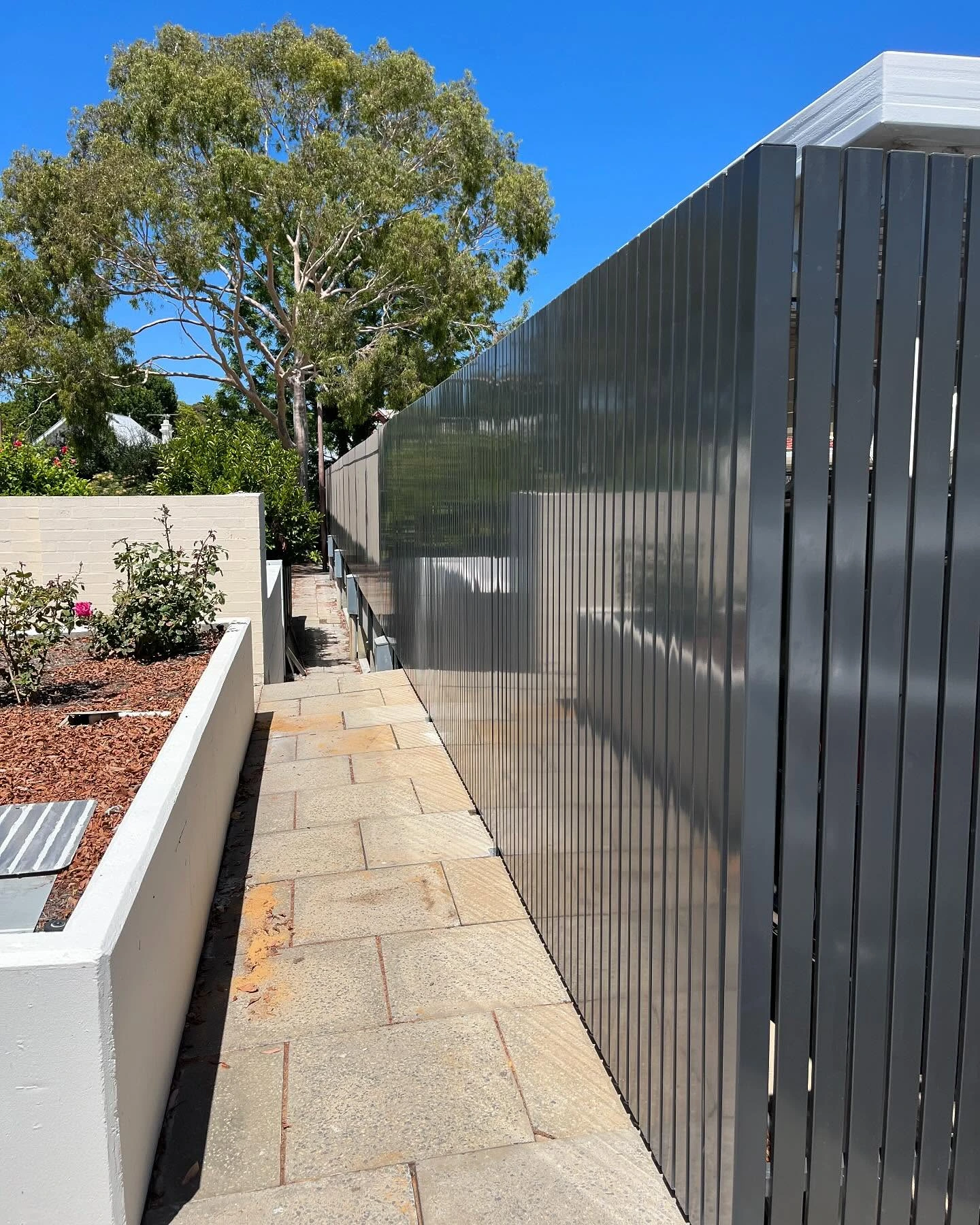 Horizontal aluminium slat fence and gate combination in Perth