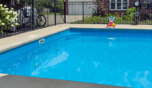 Compliant tubular pool fence around a Perth backyard pool